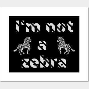 I'm not a zebra. White letters with a mask in the shape of diagonal stripes and two black and white zebras Posters and Art